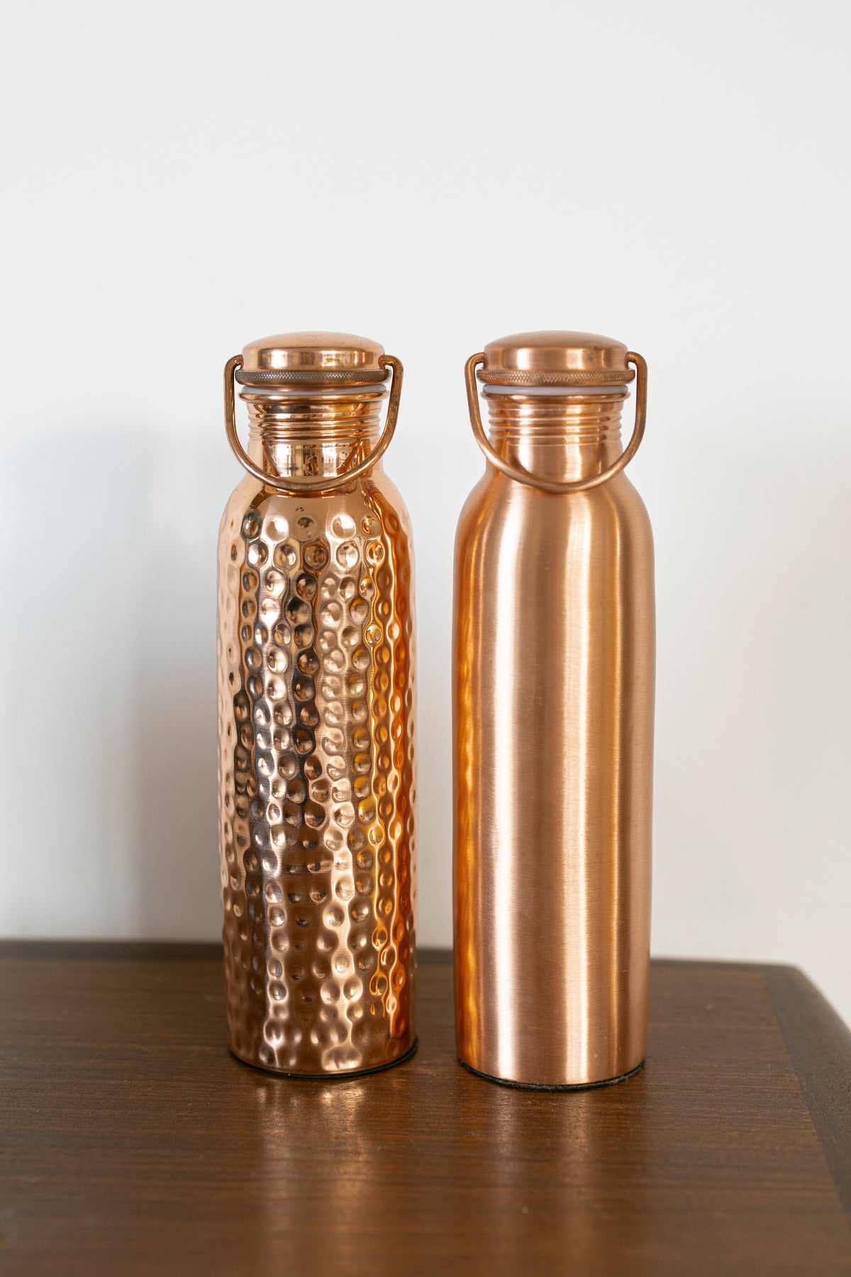 Kopero hammered copper water bottle with carry pouch
