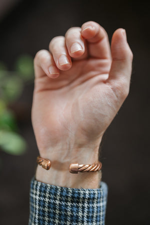 Kopero Copper Bracelet Twisted, on the wrist, with the ends of the twisted wire visible
