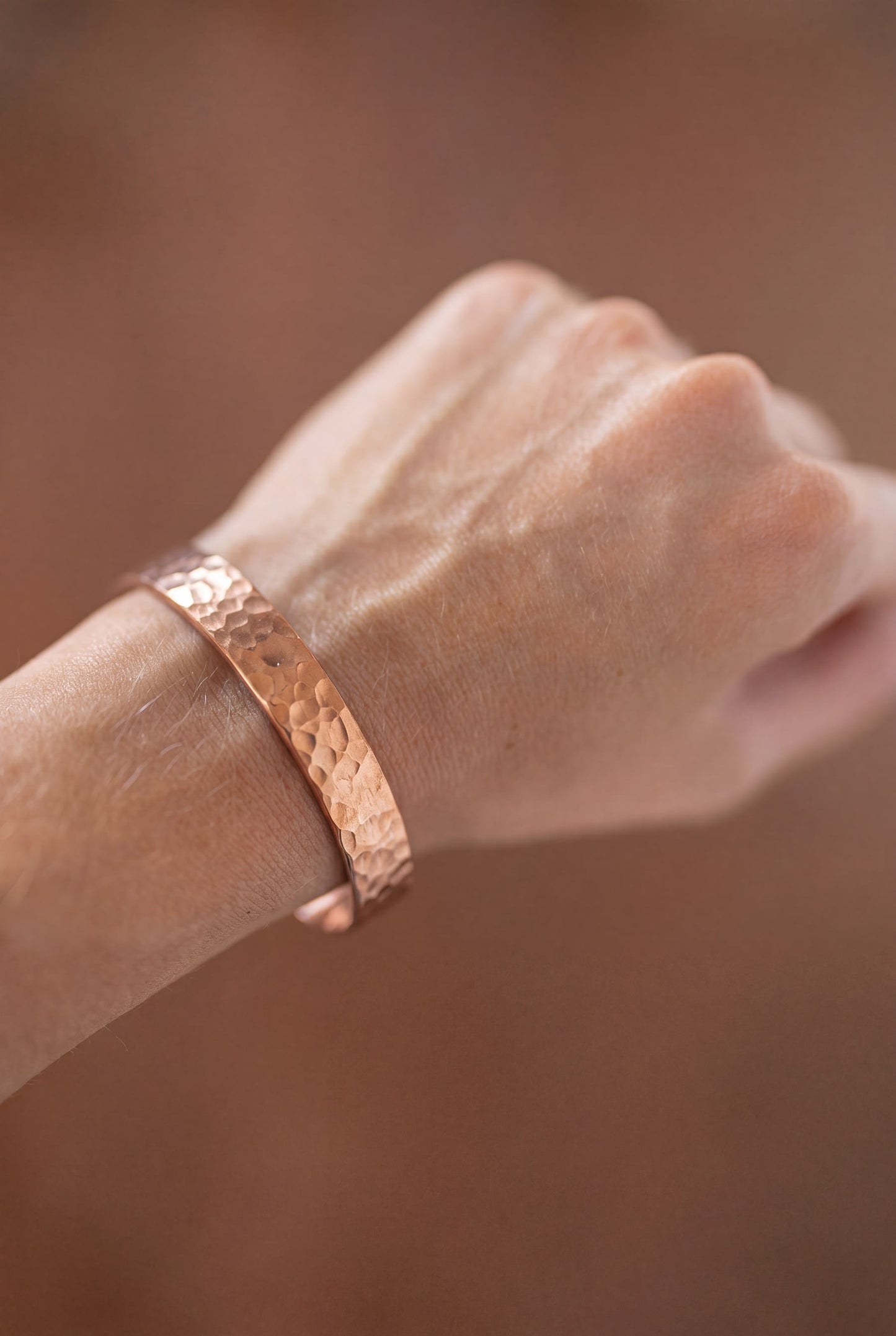 Kopero Copper Bracelet Hammered on the wrist, close-up of the hammered texture
