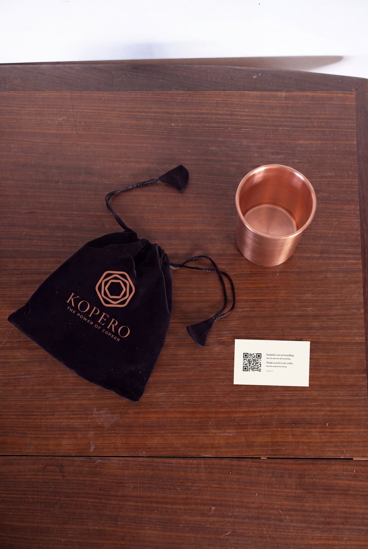 Kopero Copper Cup Smooth from above with velvet pouch and thank-you card