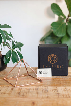 Kopero Copper Pyramid Energizer Smooth Small (14.56 cm), with the black branded box and the thank-you card