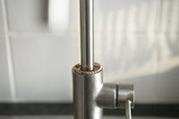 Kopero Copper Tensor Ring mounted on the tap, close-up of the closed ring