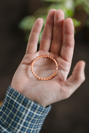Kopero Copper Tensor Ring, on an open palm