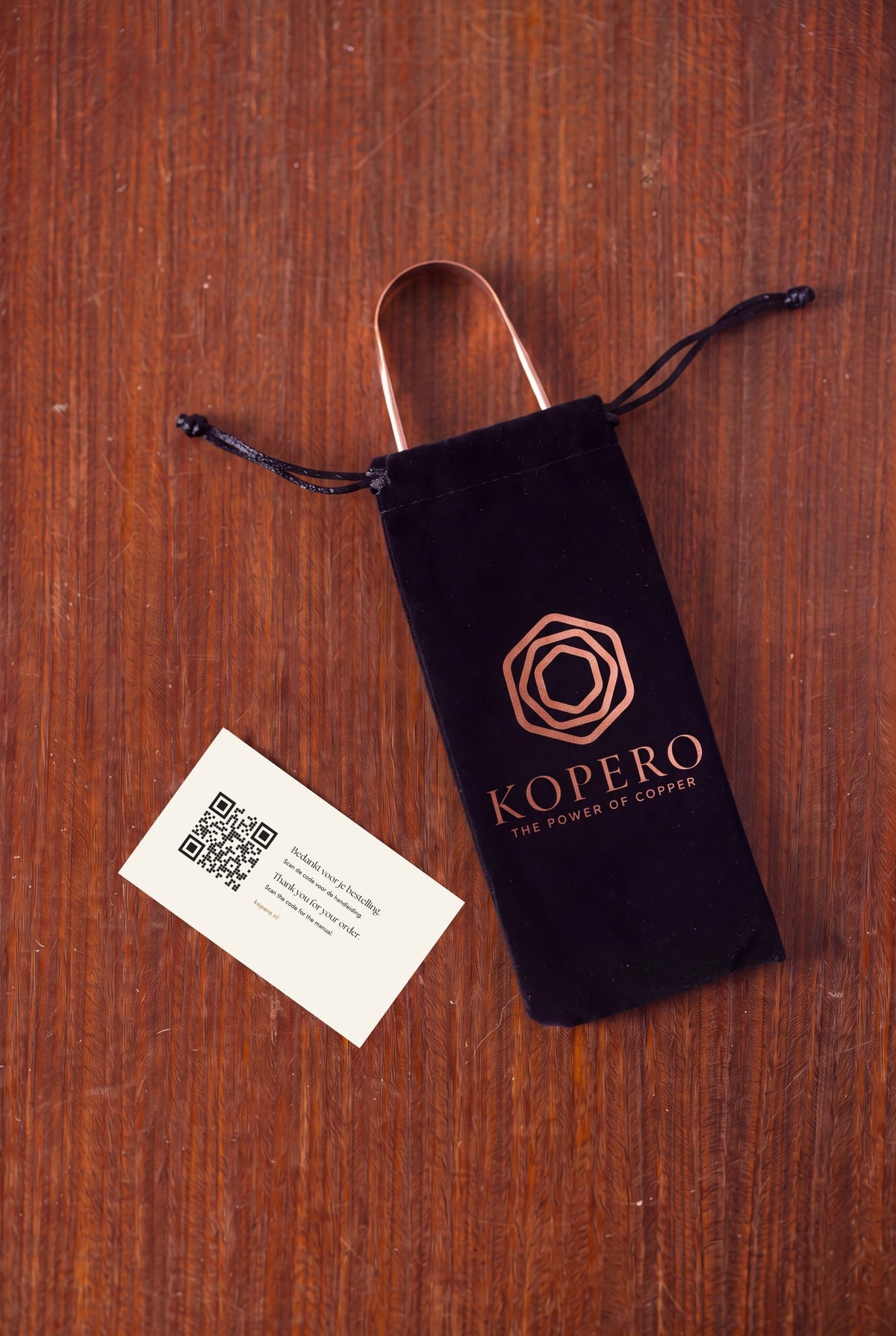 Kopero Copper Tongue Scraper in the velvet pouch with card and QR code