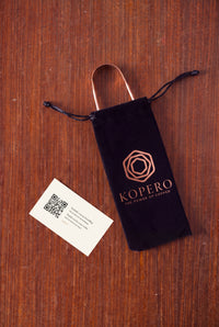 Kopero Copper Tongue Scraper in the velvet pouch with card and QR code